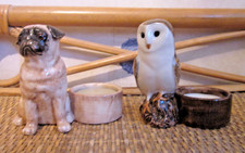 Quail Pottery owl and pug tealight holders