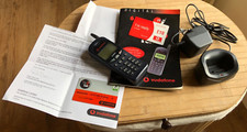 Vodafone GSM phone, charger, instructions, expired new simcard, collectable