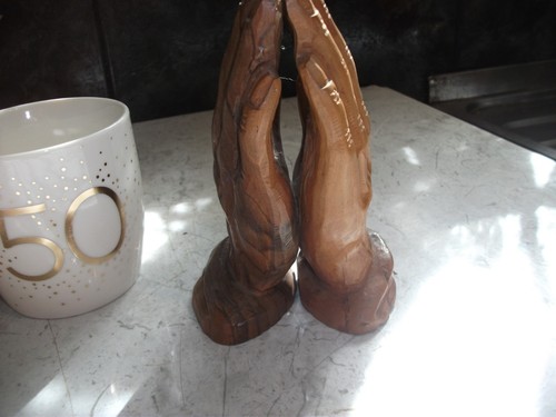 Praying hands carved from wood - from,