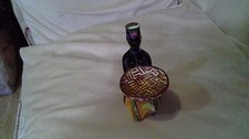 Vintage 1960s Drioli Liquor Bottle (empty) kneeling African Woman With Dish