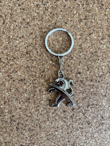 Metal peugeot logo - ,