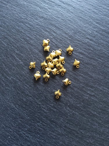 100 tiny gold - or,