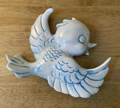 Lefton flying bluebird - flying,