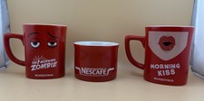 2 Nescafe Cheeky Mugs Red