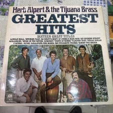 Herb Alpert Autographed Signed Greatest Hits Album Cover AMLS 980