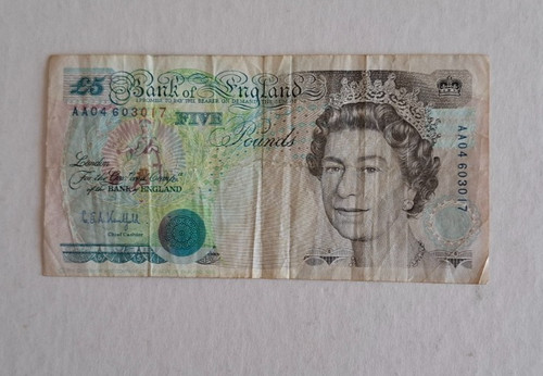 Five pounds note - £5,