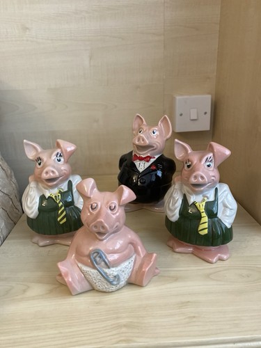 Four natwest pigs family piggy - natwest,