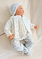 Hand knitted newborn baby boy