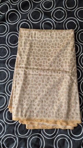 Cream net material saree - net,