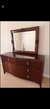 Stylish dark wood dresser and