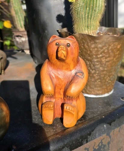 Hand carved wooden bear - hand,