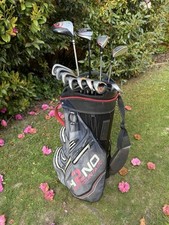 NICE SET OF WILSON GOLF CLUBS IN A SUN MOUNTAIN WATERPROOF CART BAG. FREE POST