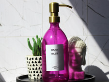 Refillable soap dispenser