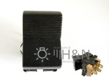 Light switch headlamp control