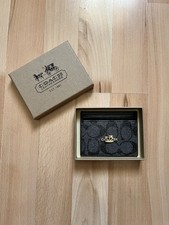 Women’s Black Coach Card