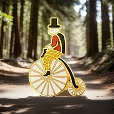 Rupert Bear Riding A Penny