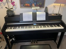 Casio Celviano AP-620 digital piano with Yamaha stool, plus headphones