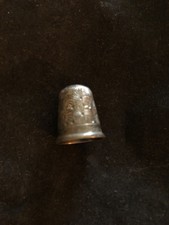 Vintage metal thimble with