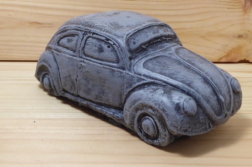 Cast stone beetle - beetle, hand