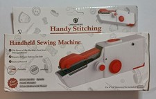 Portable hand held sewing