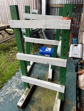 Green and white painted wooden jump wings