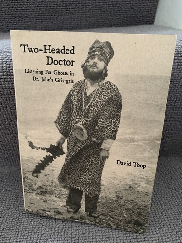 Two headed doctor listening - :,