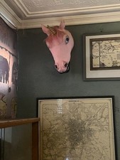 Faux Taxidermy Pink Unicorn Head Mounted to Hang on a Wall