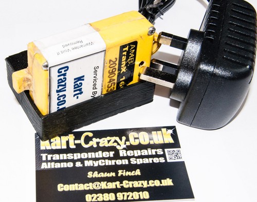 Charger cradle for amb - &,