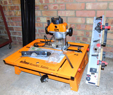 TRITON 1/2" PRECISION PLUNGE ROUTER WITH RTA 300 ROUTER TABLE NEEDS ATTENTION
