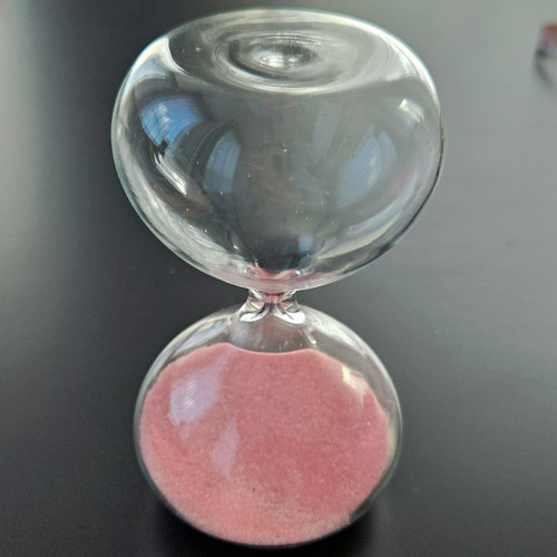 Glass pink sand - glass, hourglass