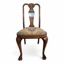 Carved walnut side chair by