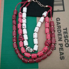 Three strands of imitation Coral  Beads , 50 beads in total, on strings with fas