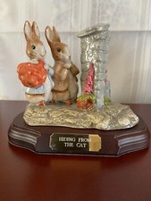 Beswick Ware Beatrix Potter "Hiding from the Cat" figurine with base.
