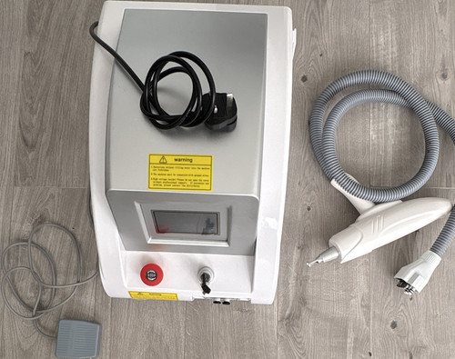 Laser tattoo removal device - removal,