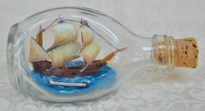 NAUTICALIA HAND CRAFTED TINY SHIP IN BOTTLE - SOUND CONDITION