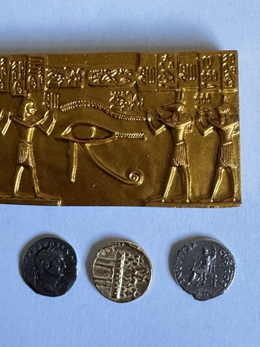 Egyptian plaque with - with, coins