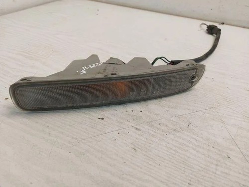 Mazda 323 front - iv, left