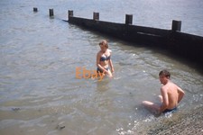 35mm Slide - Teenage Girl & Boy In Sea, Isle Of Sheppey, 1961
