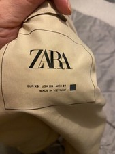 beige body warmer size 6 