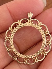9 ct. Full sovereign pendant