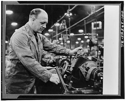 1940s factory worker operating - 1940s,