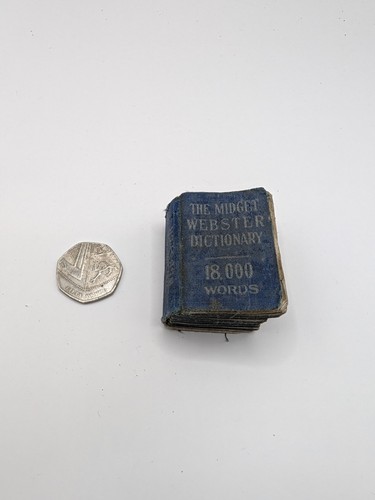 The midget webster dictionary - midget,