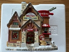 Lemax "The Melted Snowflake" from the Vail Village Collection.