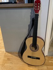 A learner’s ACOUSTIC GUITAR