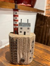 Lighthouse on a cliff ornament