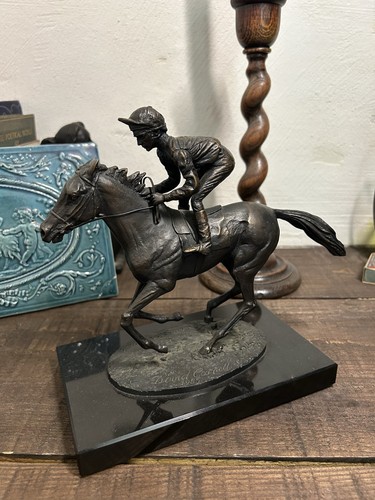 Heavy bronze sculpture a - heavy,