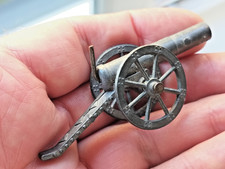 TWO toy metal matchstick