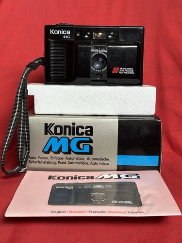 Konica 35mm point shoot - &,