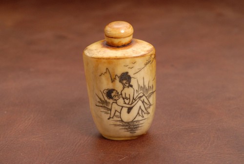 Vintage carved bottle with
