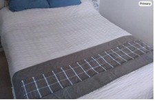 Table/bed/chest runner, grey/orange/white plaid on grey linen design. Raw edge.